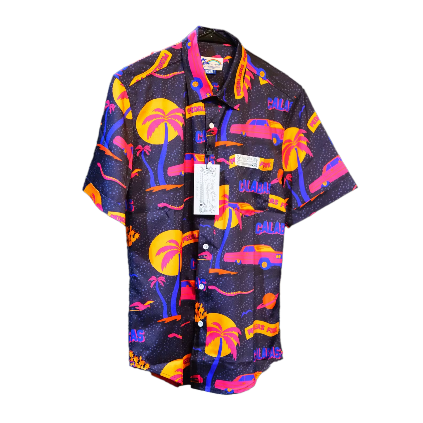 Party shirt with graphics of cars and palm trees