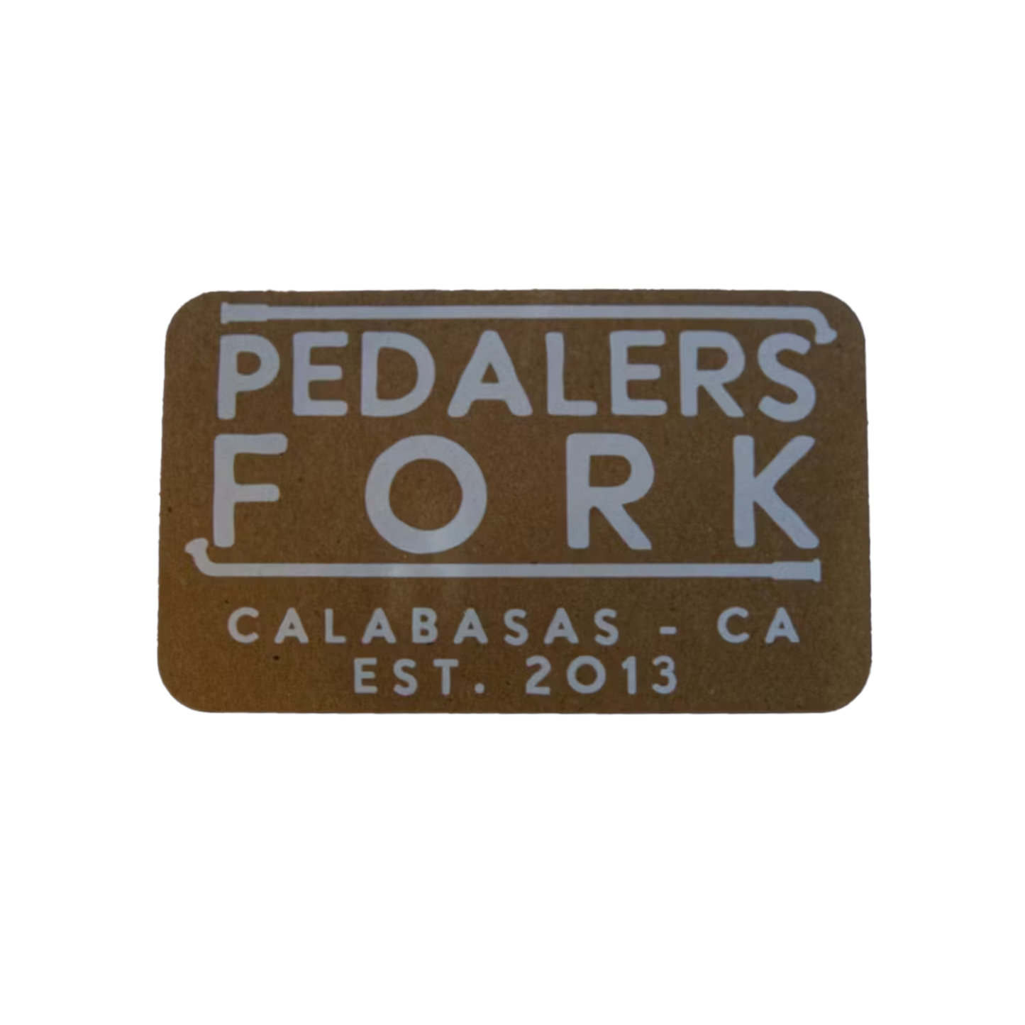 Brown colored sticker with text "Pedalers Fork Calabasas-CA EST. 2013"