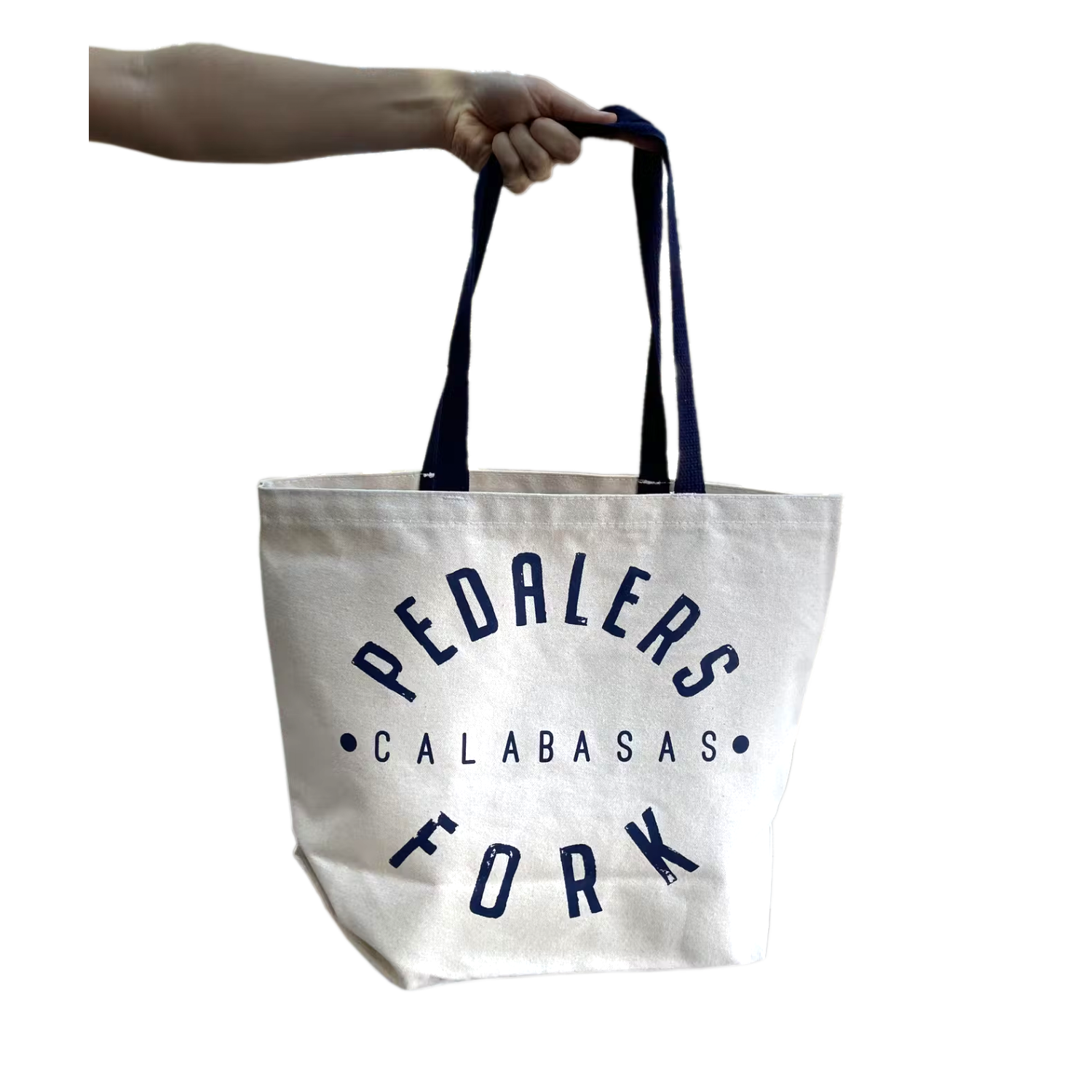 White tote bag with blue strap, Pedalers Fork logo with Calabasas in between